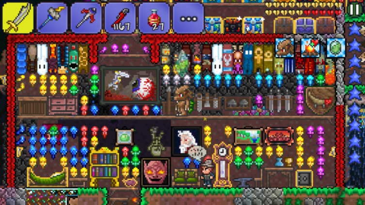 a picture of a very bright house filled with lots of torches, on old terraria mobile
